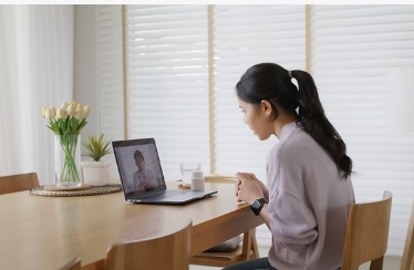 A person joining a video call from home