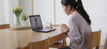 A person joining a video call from home